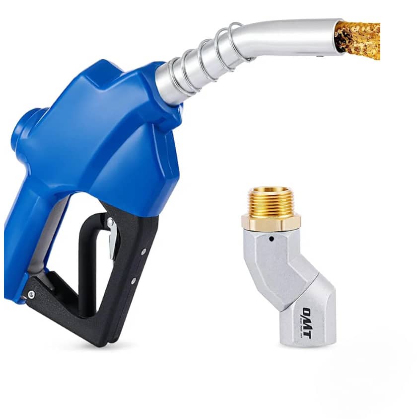 A blue fuel nozzle pours liquid onto a silver and gold angled hydraulic metal fitting, which has OTAI printed on its side. The background is white, highlighting precision in fuel handling components.
