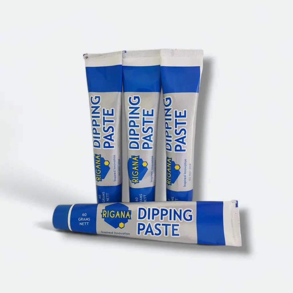 Four tubes of Rigana Dipping Paste, ideal for hydraulic and fuel handling applications, are standing upright with one tube lying horizontally in front. The white and blue packaging features bold yellow accents and “Dipping Paste” labeling.